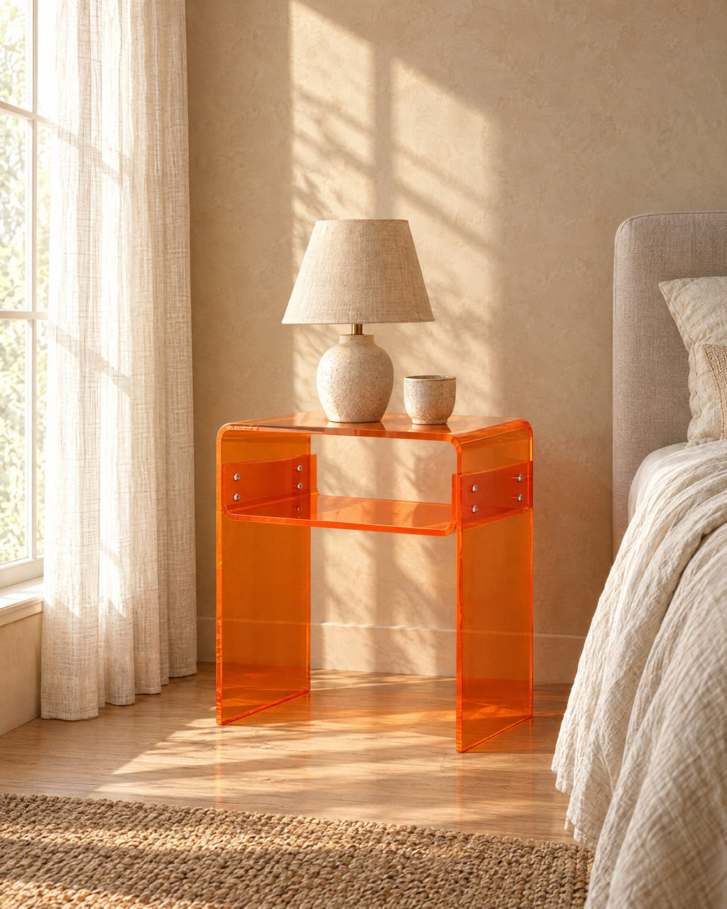 Amber acrylic bedside table in warm morning light