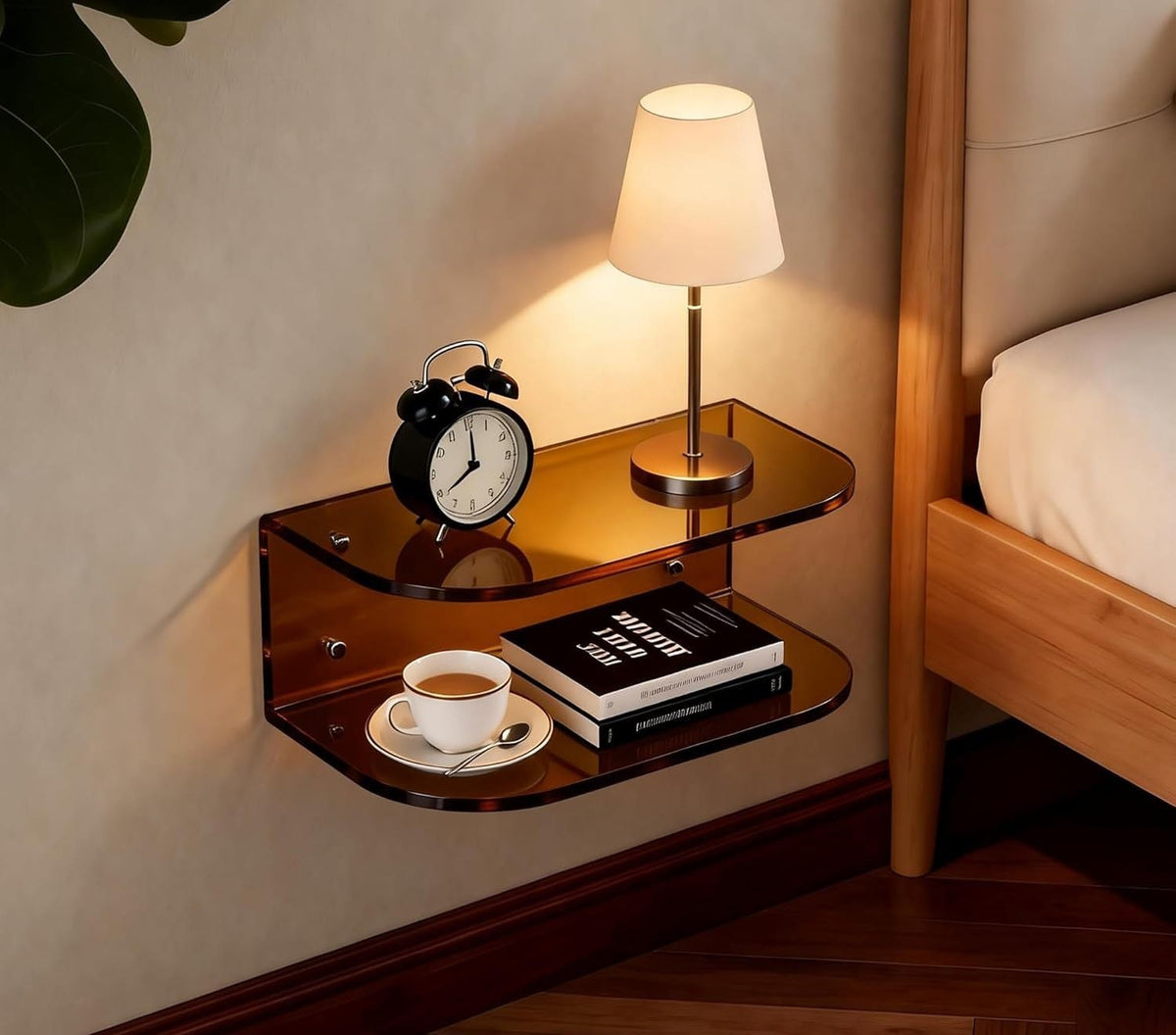 Amber acrylic floating bedside shelf in a bedroom