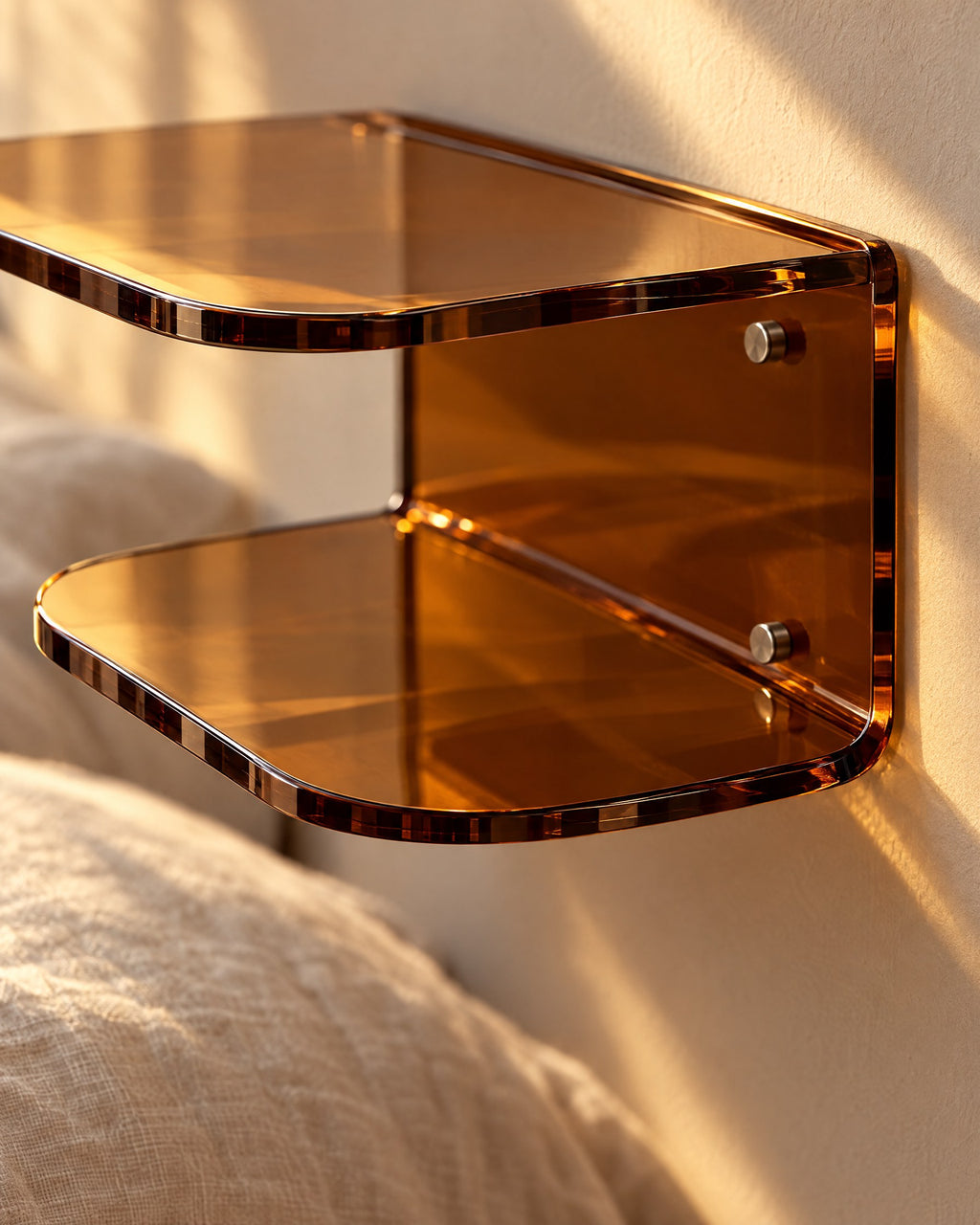 Close-up detail of the amber acrylic floating bedside shelf