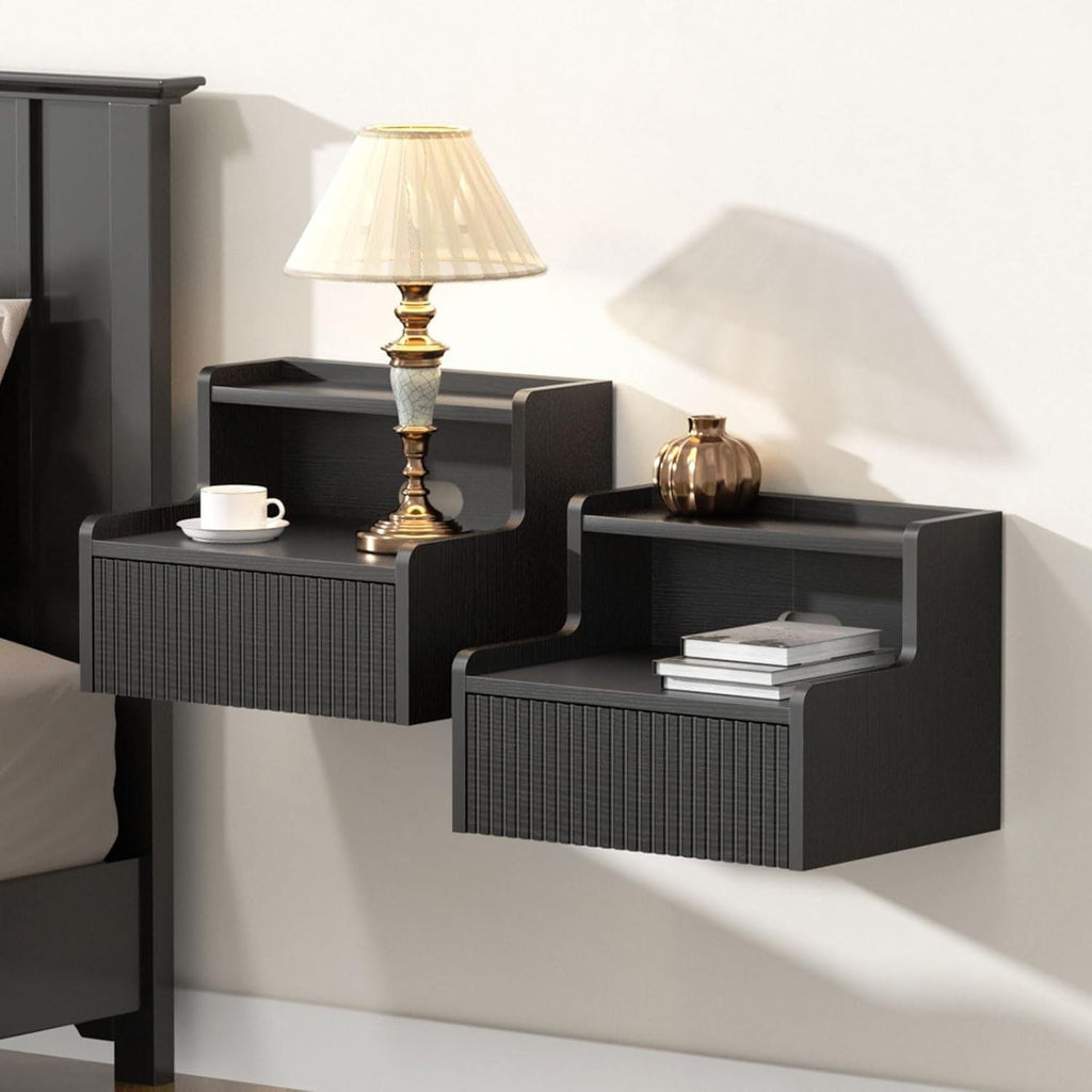 Black floating bedside table in a bedroom