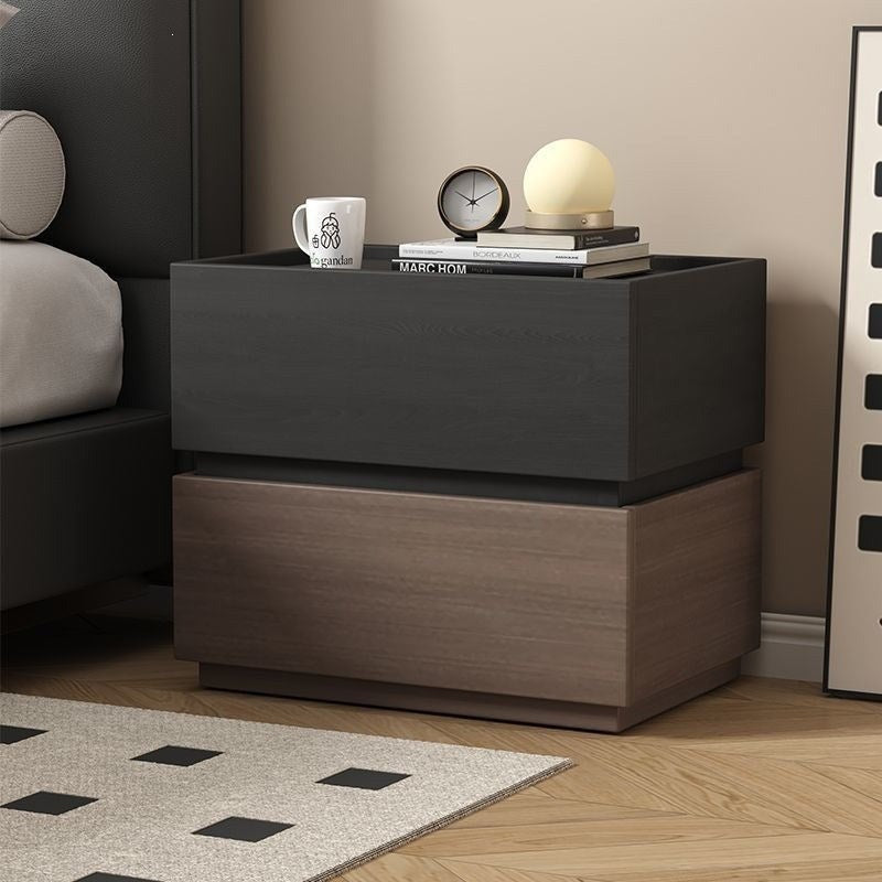 Front view of the modern bedside table of two stacked blocks, black wood grain over walnut tone