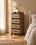 Three-quarter view of the brown bedside chest showing its swivel castors