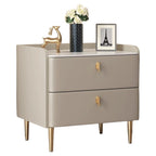 Front view of the champagne grey bedside table with two drawers and gold legs