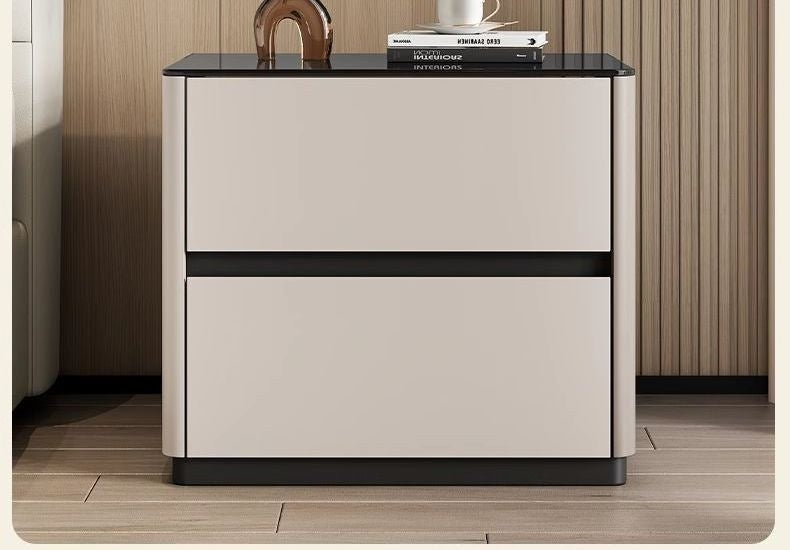Front view of the cream bedside table with a glossy black top and two drawers