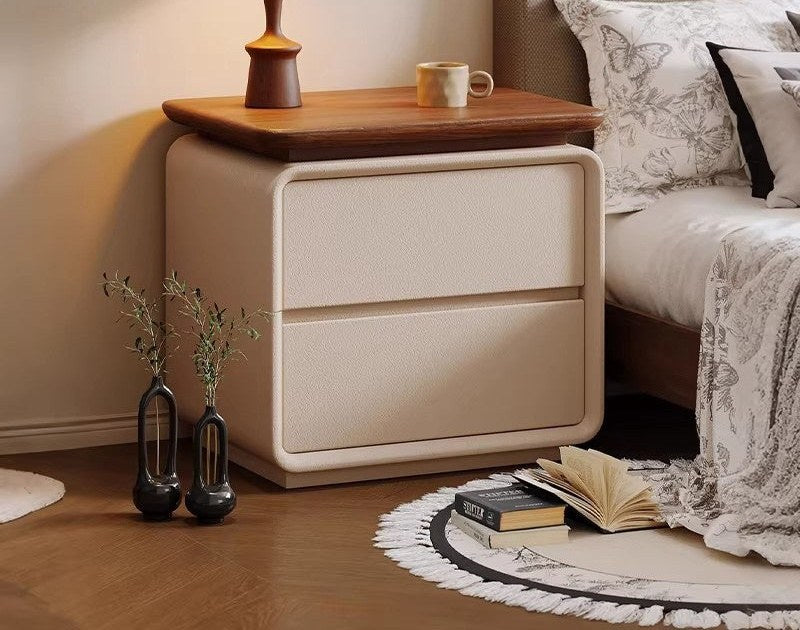 Cream bedside table with a walnut-tone top and two drawers, supplier photograph