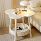 Cream flower-shaped bedside table with a storage basket, supplier photograph