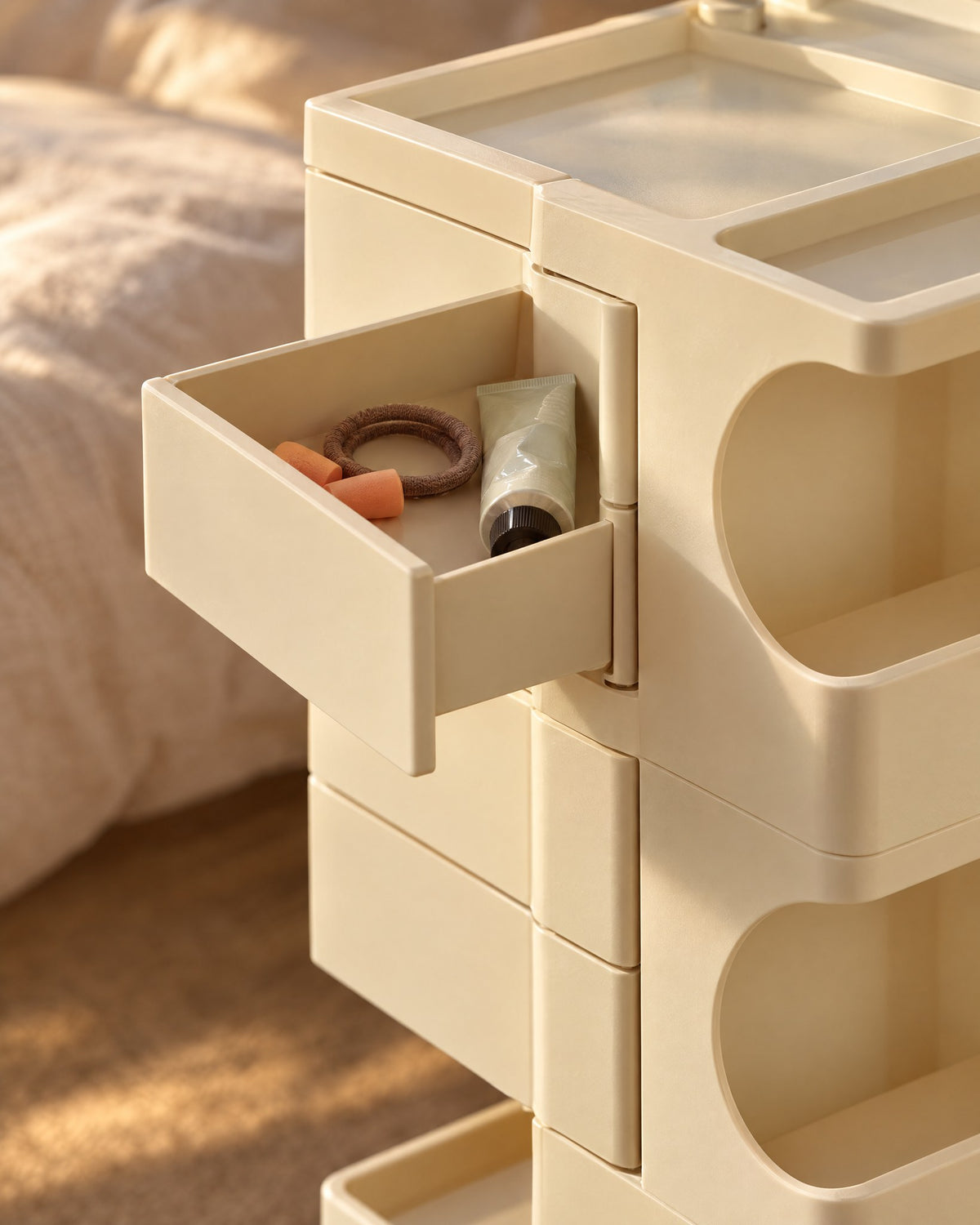 Close-up of a swivel drawer swung open on the cream trolley