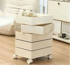 Cream rotating storage unit with three trays swivelled open