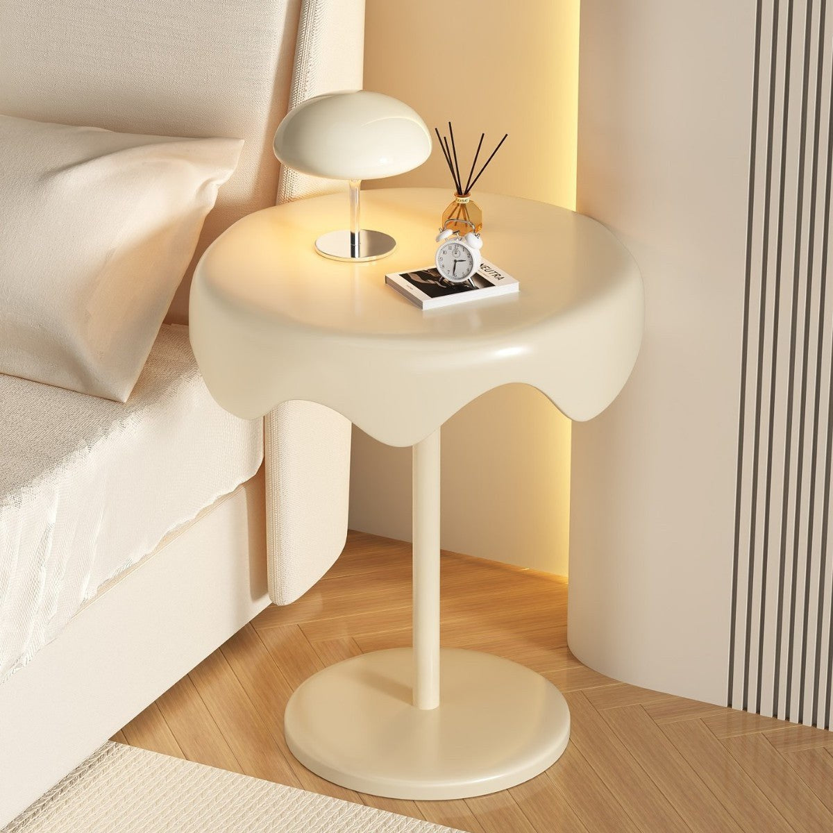Cream round pedestal bedside table, front view
