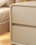 Close-up of the rounded corner and the finger groove between the drawers