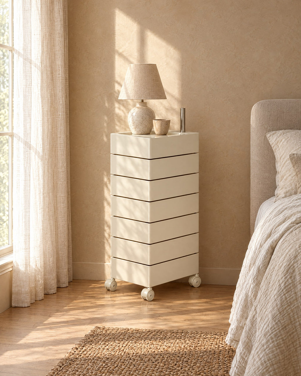 Cream seven-drawer tower on castors in morning light
