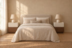 Pair of two-tone cream and walnut bedside tables on each side of a double bed