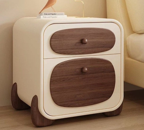 Cream bedside table with two walnut drawer fronts and rounded feet