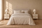 Pair of cream wave bedside tables on each side of a double bed