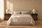 Pair of floating black and walnut bedside tables on each side of a double bed
