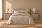 Pair of greige bedside tables on each side of a double bed