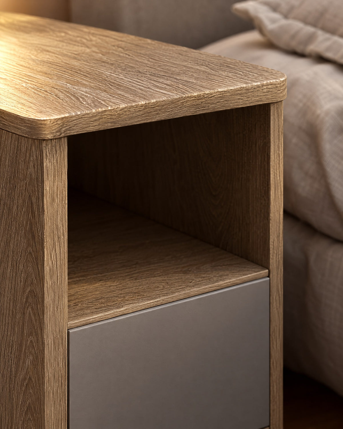 A smooth, handle-free grey drawer