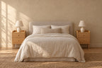 Pair of narrow cherry bedside tables on each side of a double bed