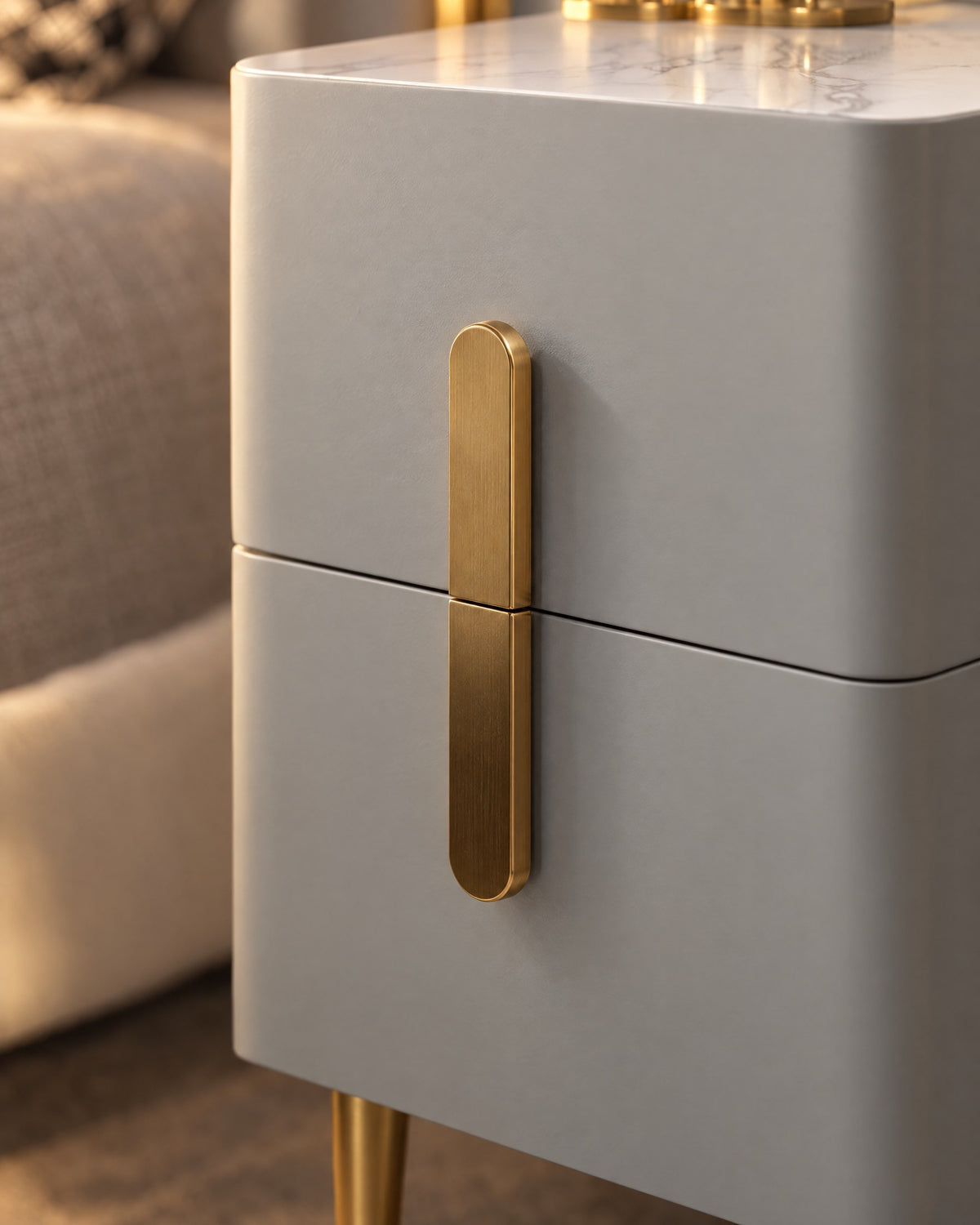 One gold handle, two drawers