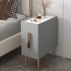 Narrow grey bedside table with a marble-effect top and gold legs, supplier photograph