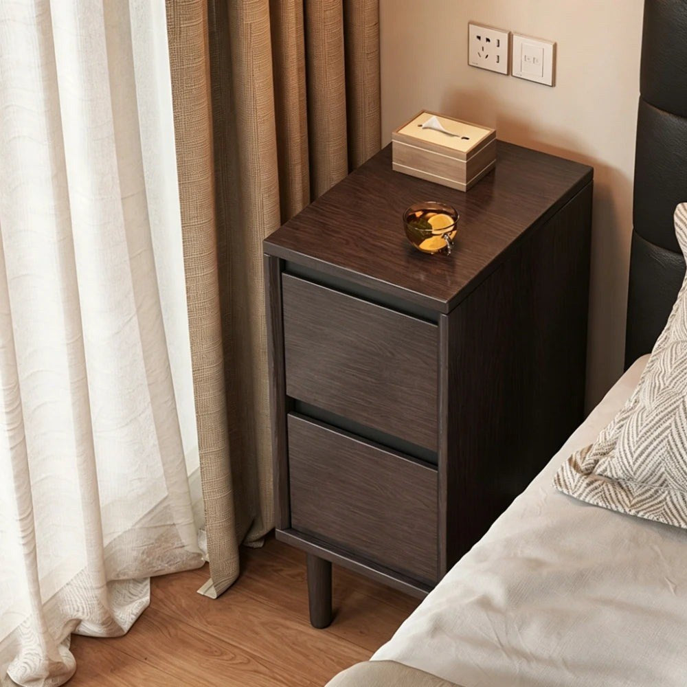 Front view of the narrow walnut-effect bedside table