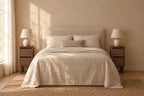 Pair of narrow walnut-effect bedside tables on each side of a double bed