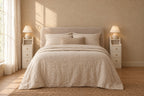 Pair of narrow white bedside tables on each side of a double bed