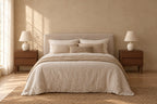 Pair of Nordic walnut bedside tables with two handle-free drawers on each side of a double bed