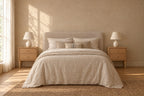 Pair of oak bedside tables on each side of a double bed