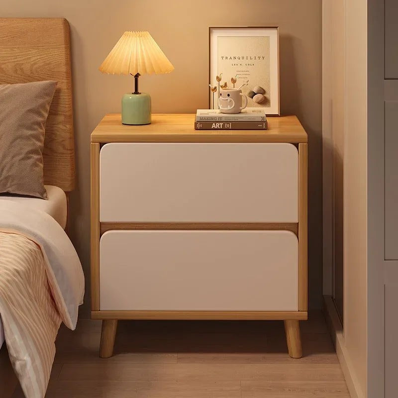 Front view of the oak and cream bedside table with two handle-free drawers