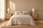 Pair of oak-effect bedside cabinets on wheels on each side of a double bed
