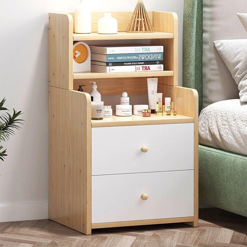 Oak and white bedside table with hutch shelves in a bedroom