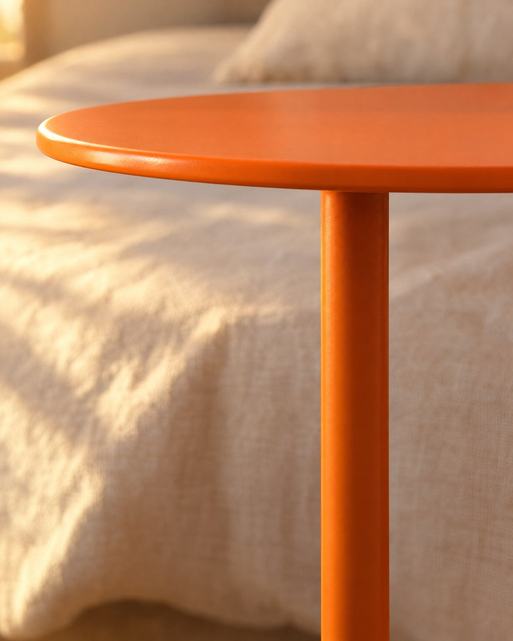 Close-up of the orange metal top edge and the slim column