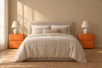Pair of orange rounded bedside tables on each side of a double bed