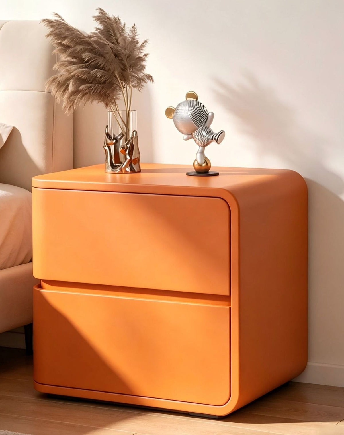 Orange rounded bedside table in a bedroom
