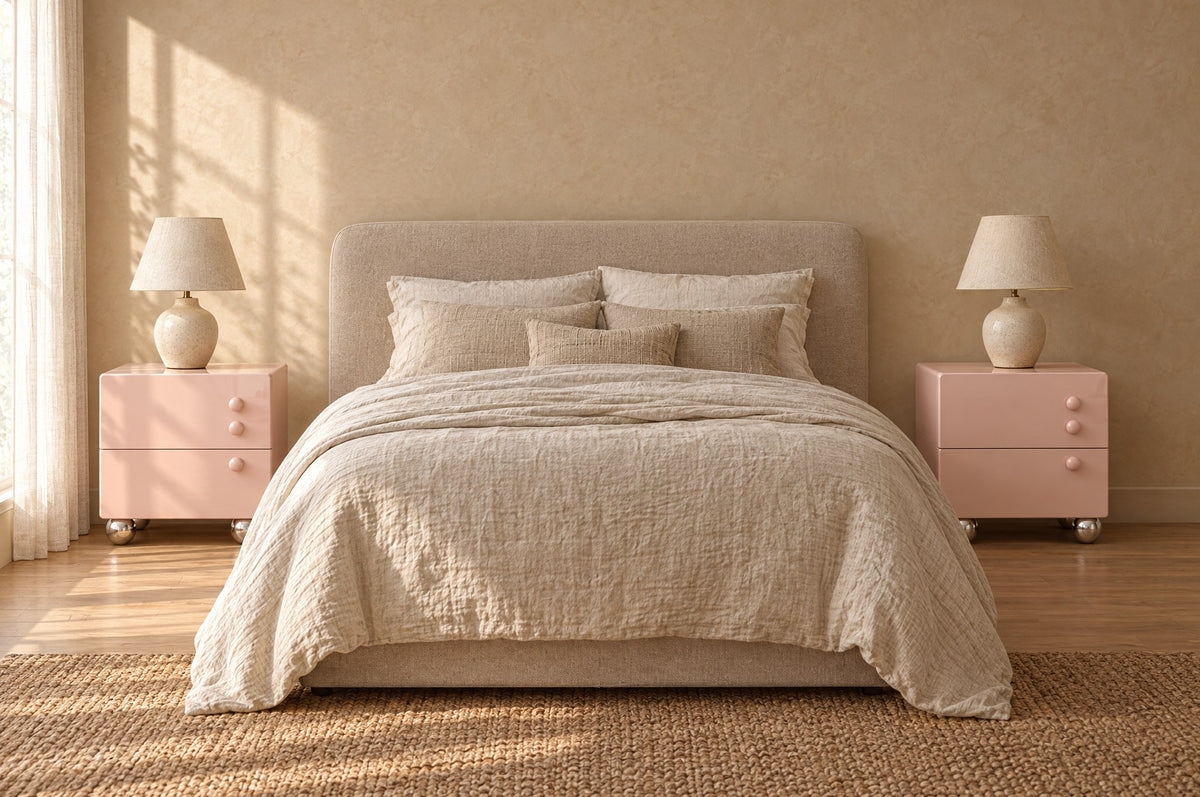 Pair of pink bedside tables on each side of a double bed