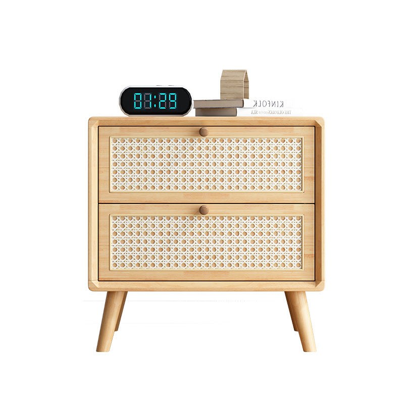 Front view of the light wood rattan bedside table with two cane drawers