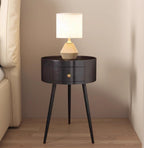 Round black bedside table with drawer, supplier product photo