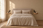 Pair of round wall-mounted bedside tabless with wood-effect top fixed on each side of a double bed