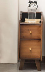 Front view of the slim walnut-finish bamboo bedside table