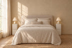 Pair of slim cream bedside tables on each side of a double bed