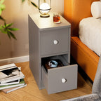 Slim grey bedside table in a bedroom