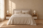 Pair of small oak and white bedside tables either side of a double bed