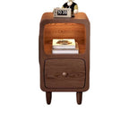 Front view of the small walnut bedside table with an open niche and one drawer