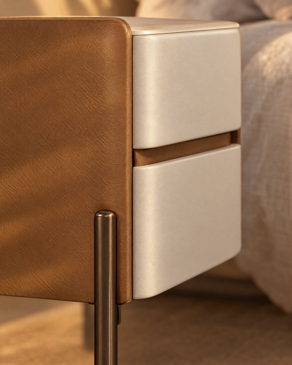 Close-up of the ivory drawer fronts and the tan faux-leather frame