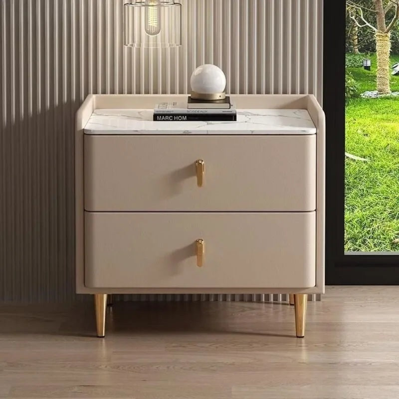 Front view of the taupe bedside table with two drawers and gold legs