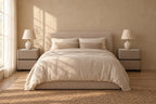 Pair of taupe faux leather bedside tables on each side of a double bed