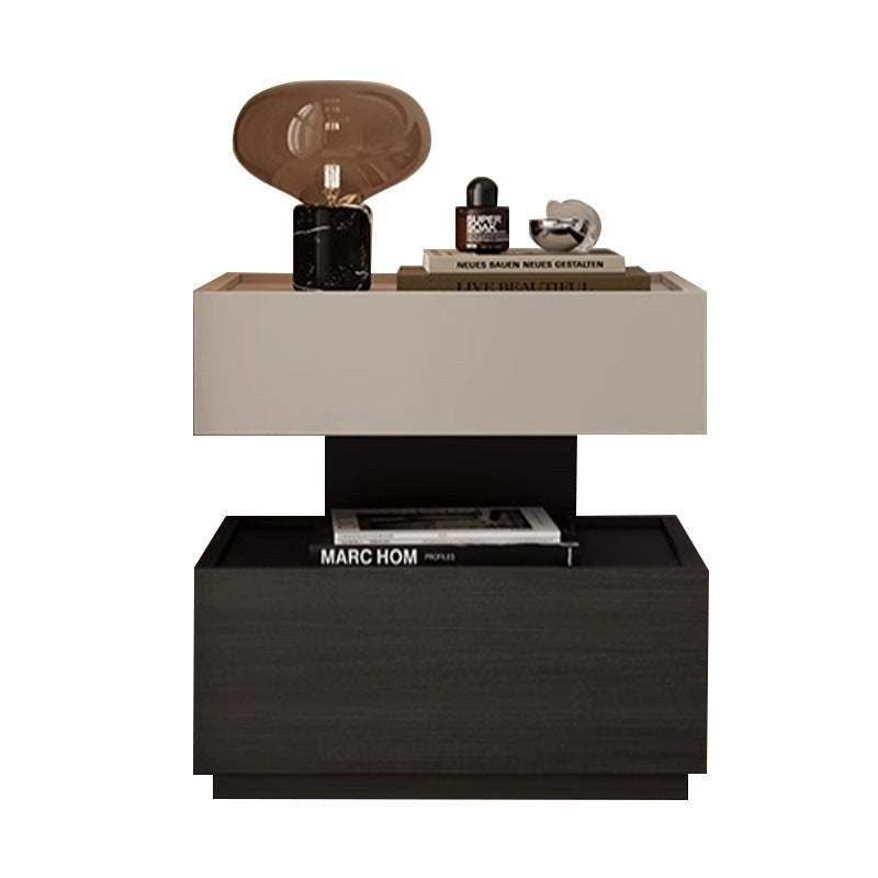 Front view of the two-tier greige and black bedside table