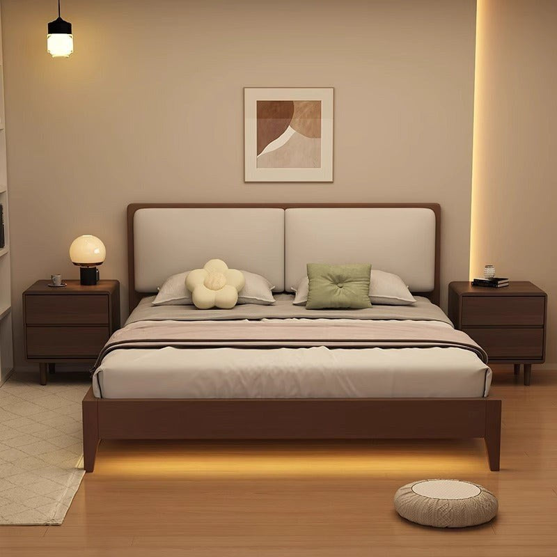 Two walnut bedside tables with two drawers in a bedroom