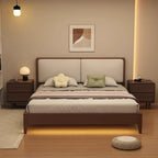 Two walnut bedside tables with two drawers in a bedroom